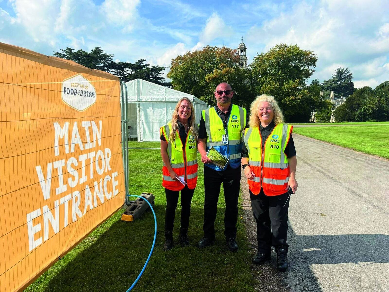 NVC stewards on the visitor entrance at a food and drink festival