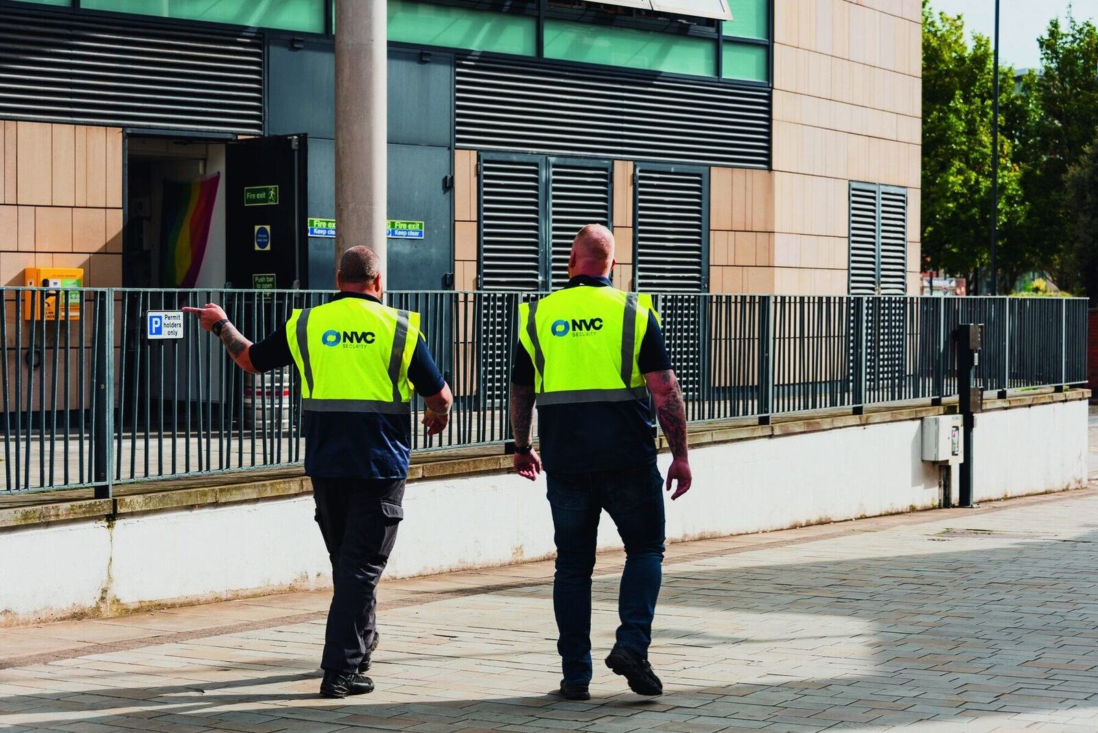 Two NVC officers on patrol at a vacant site